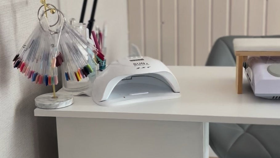 Nail station at Beauty By Aimee with nail samples and UV lamp in Omagh, Northern Ireland, GB.