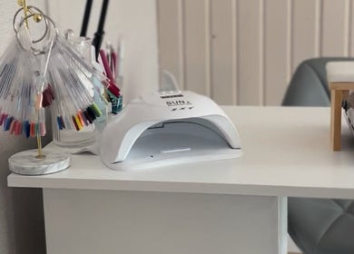 Nail station at Beauty By Aimee with nail samples and UV lamp in Omagh, Northern Ireland, GB.