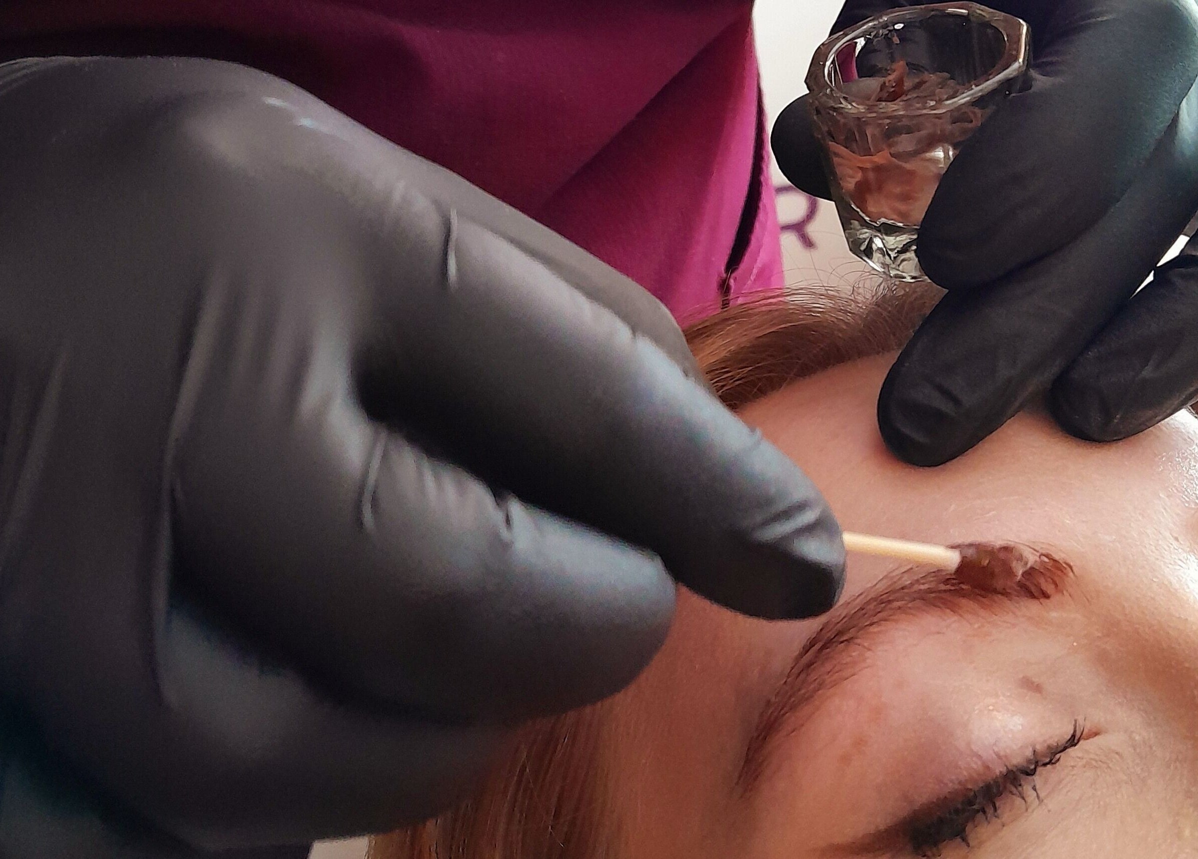 Expert applying eyebrow tint at Align & Revive Holistic Therapy in Knaresborough, England, GB.