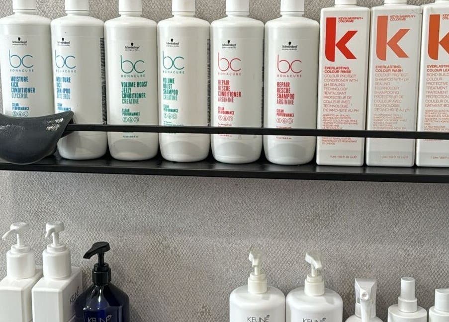 Hair care products on display at Hair By Sandra, Rīga, LV, showcasing premium salon quality.