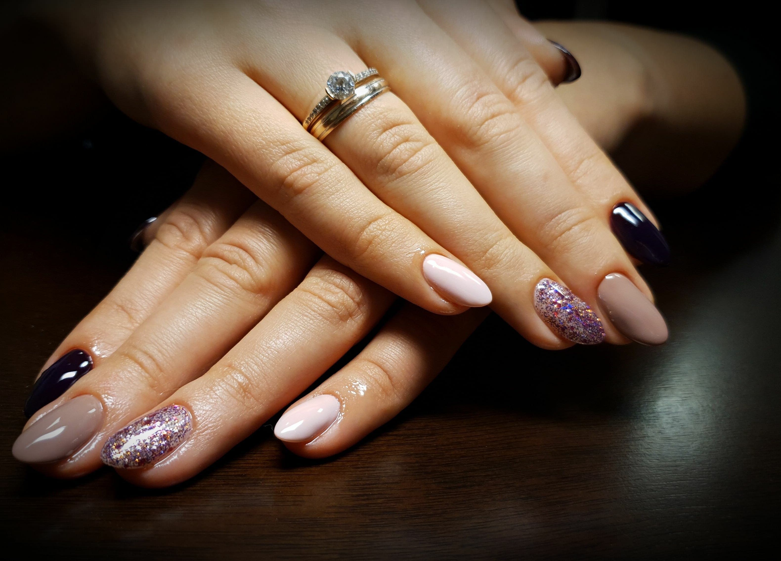 Elegant nail art with glitter and rings at Kluuga Skaistuma Istaba, Rīga, LV.