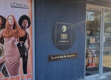 Entrance to Hair Colour & Art salon, Dundas Valley, New South Wales, AU with chic model poster.