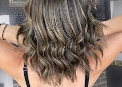 Stylish waves hairstyle at Hair Colour & Art, Dundas Valley, New South Wales, AU. Perfect curls and highlights.