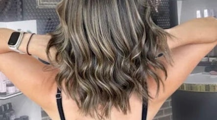Stylish waves hairstyle at Hair Colour & Art, Dundas Valley, New South Wales, AU. Perfect curls and highlights.