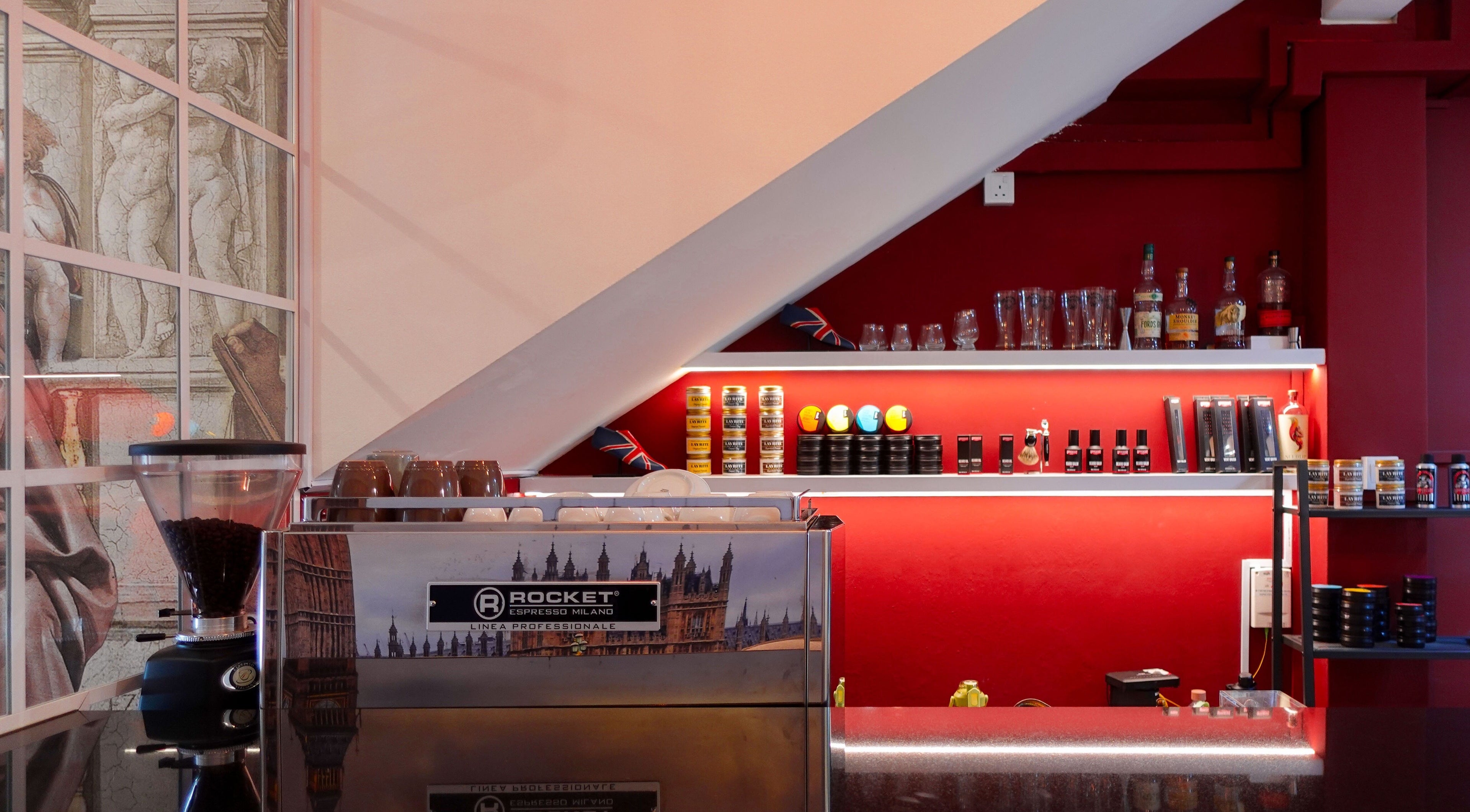 Elegant coffee setup at Jermyn Street, Singapore, Singapore, SG with rich red tones and luxury products.