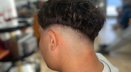Close-up of a stylish fade haircut by Gianluca_cutz in Ħaż-żabbar, MT salon.