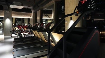 Modern treadmill area at Flex Gym Bgc in Taguig City, Metro Manila, PH, showcasing sleek and advanced fitness equipment.