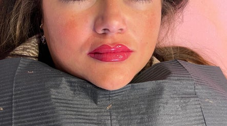 Close-up of glossy lips after a beauty treatment at LabtoLips, Halstead, England, GB.