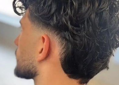 Curly men's haircut at Mens Haircut Windsor by Ritzy’s, Windsor, England, GB.