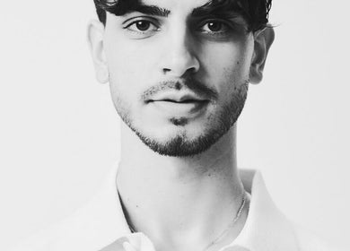 Stylish young man with a haircut at Mens Haircut Windsor by Ritzy’s, Windsor, England, GB.
