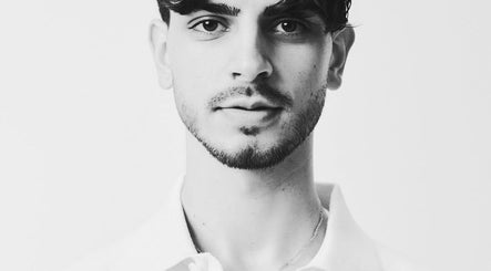 Stylish young man with a haircut at Mens Haircut Windsor by Ritzy’s, Windsor, England, GB.