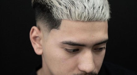 Modern platinum men's haircut at Mens Haircut Windsor by Ritzy’s, Windsor, England, GB.