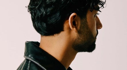 Back view of stylish men's haircut at Ritzy’s in Windsor, England, GB, showcasing modern grooming.