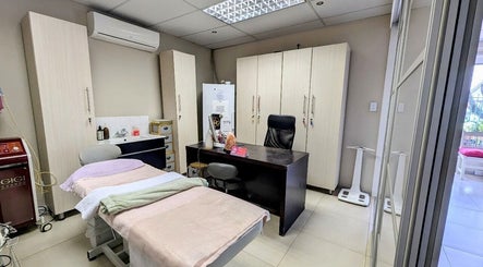 Relaxing treatment room at Pepa Health & Beauty in Pretoria, Gauteng, ZA, offering a serene wellness experience.