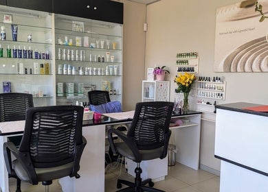 Modern beauty salon interior at Pepa Health & Beauty, Pretoria, Gauteng, ZA with elegant decor and product displays.