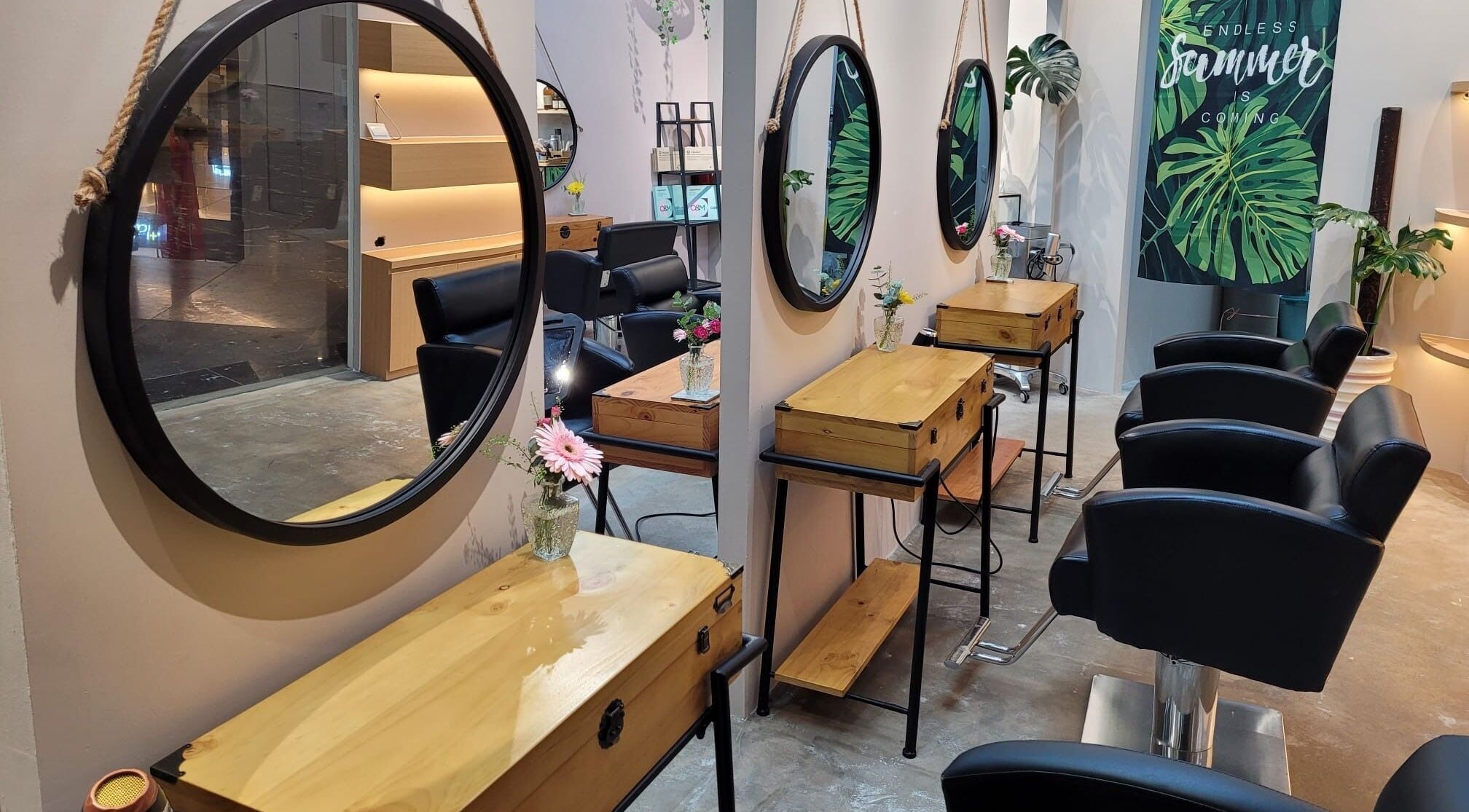 Interior view of Colour Haven Hair Studio, showcasing stylish salon stations in Singapore, Singapore, SG.