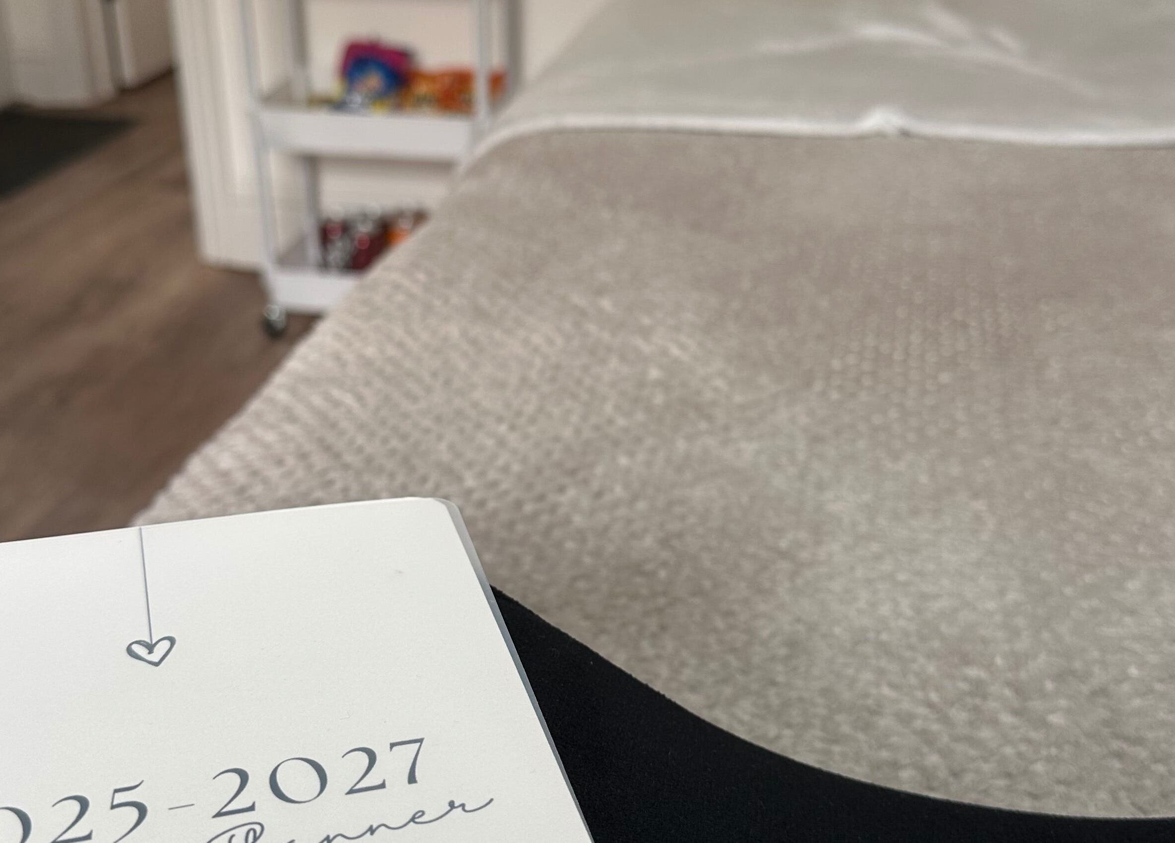 Peaceful treatment room at Dolled Up, March, England, GB, featuring a cozy massage table and modern decor.