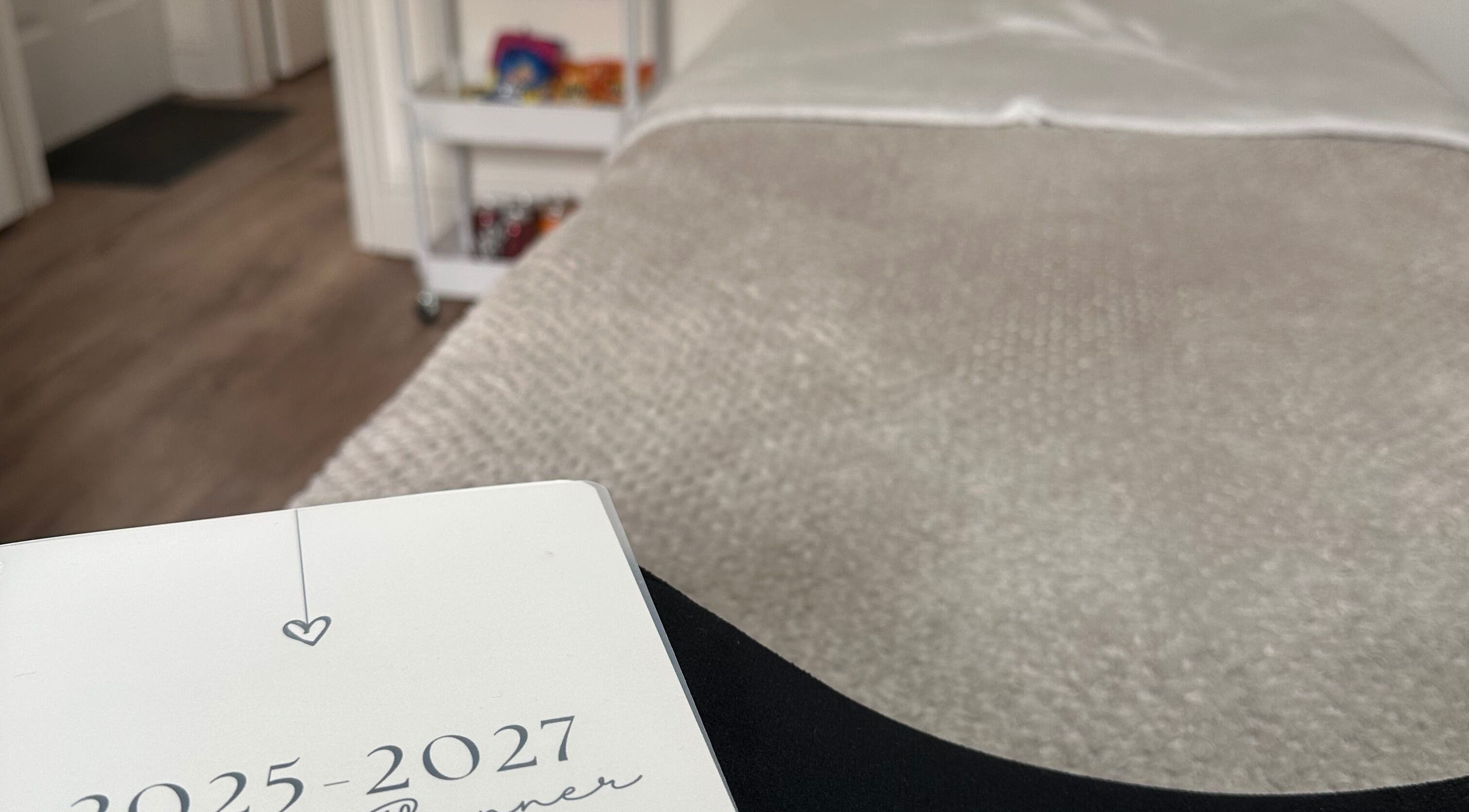 Peaceful treatment room at Dolled Up, March, England, GB, featuring a cozy massage table and modern decor.