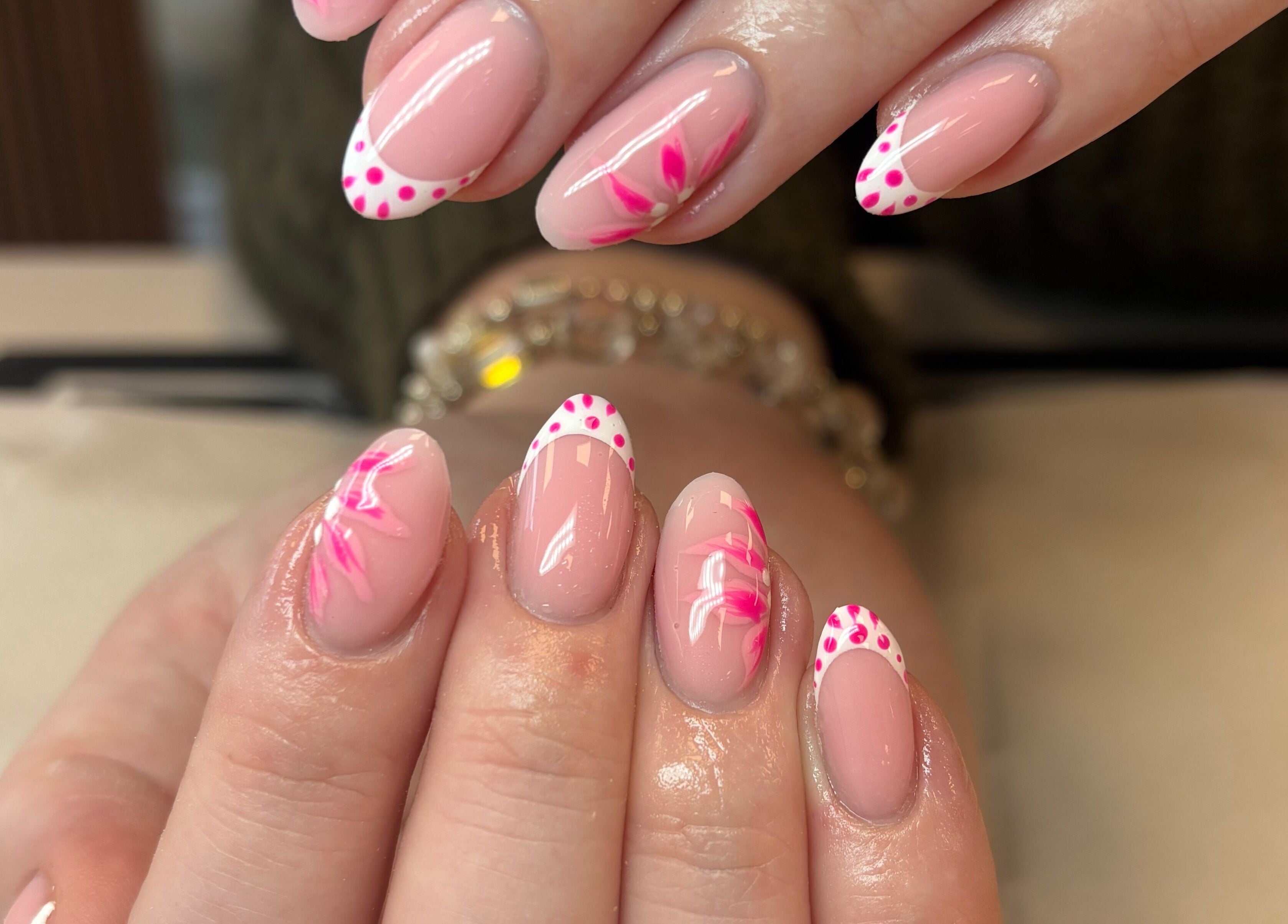Elegant nail art with pink floral designs at Glam By Jas, Limerick, County Limerick, IE.