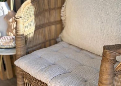 Comfortable rattan chair and cushion at Missmay Did My Hair, Ballito, Kwazulu-natal, ZA.