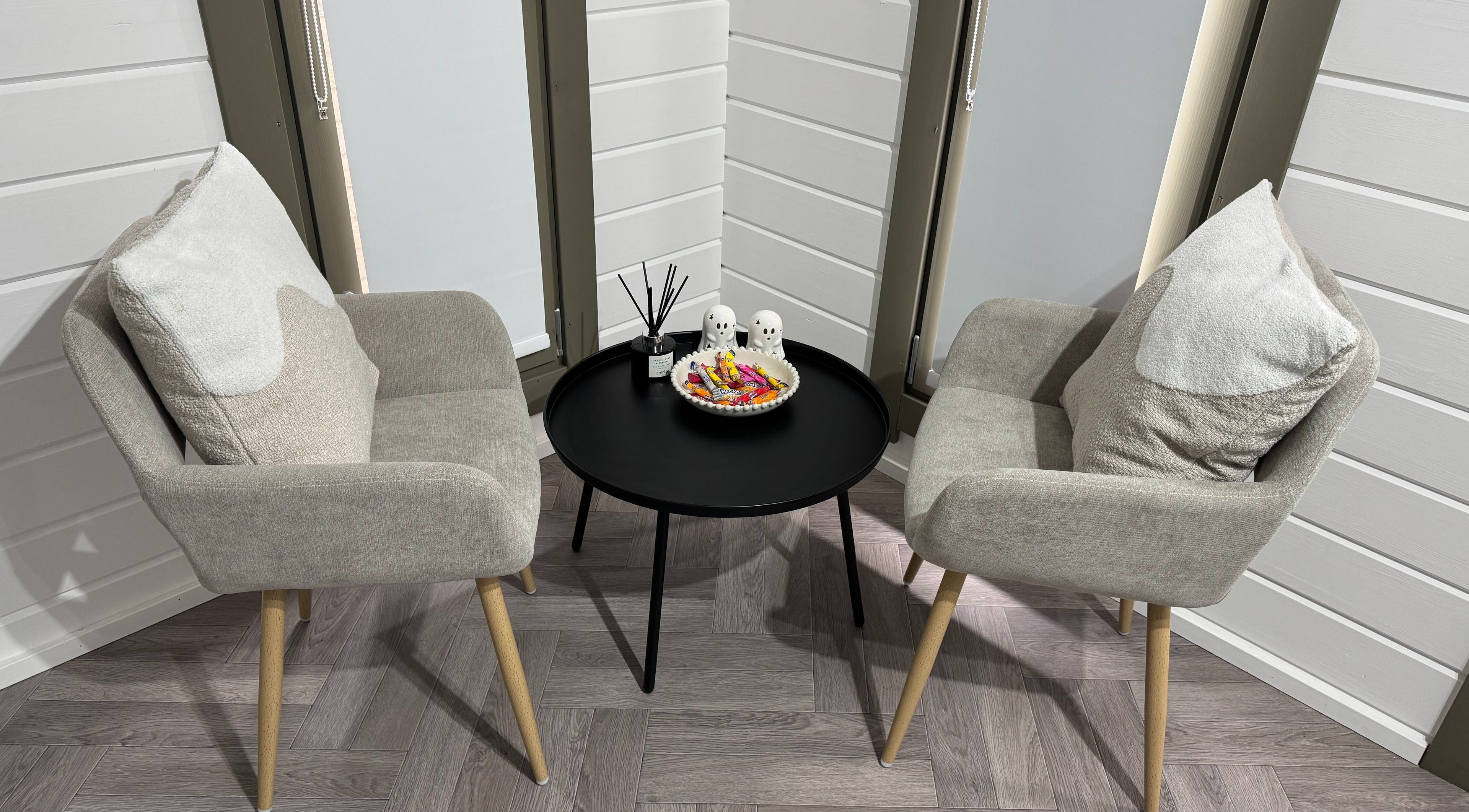 Elegant seating with a black table at Silken Beauty by Sophie, Littleport, England, GB.