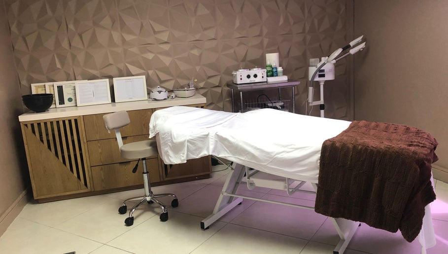 Elegant treatment room at Luna Aesthetics in Kingston 10, St. Andrew Parish, JM, with modern equipment.