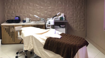 Elegant spa room at Luna Aesthetics, Kingston 10, St. Andrew Parish, JM with treatment bed and equipment.