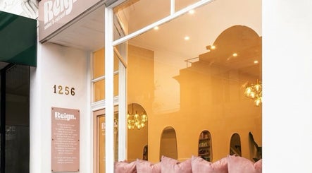 Elegant facade of Rose Rituals in Melbourne, Victoria, AU, featuring warm lighting and chic interior design.