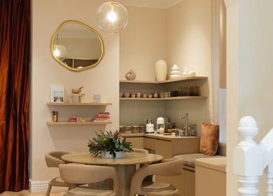 Warm, inviting interior of Rose Rituals in Melbourne, Victoria, AU with elegant decor and plush seating.