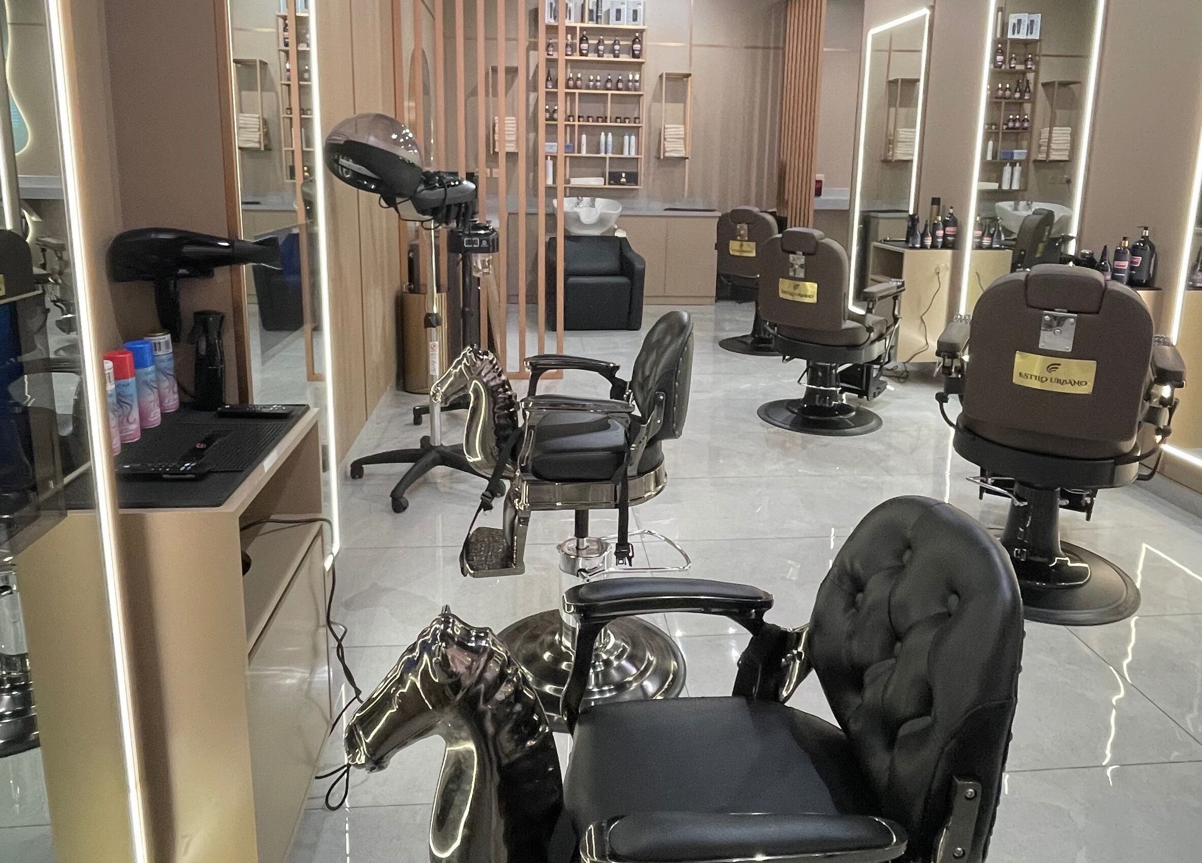 Modern barber chairs and decor at Estilo Urbano Gents Salon, Umm Al Quwain, Emirate Of Umm Al Quwain, AE.