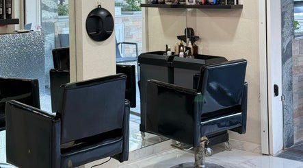 Sleek chairs and styling station at Anastasia Rallo Hair & Beauty in San Pawl Il-baħar, MT.