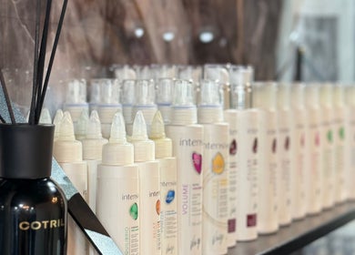 Variety of hair products at Anastasia Rallo Hair & Beauty, San Pawl Il-baħar, MT neatly arranged.