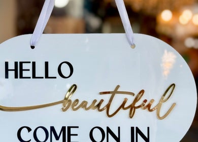 Welcome sign at Anastasia Rallo Hair & Beauty, San Pawl Il-baħar, MT invites guests with 'Hello Beautiful'.