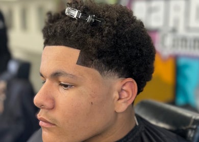 Close-up of a fresh haircut at MG TRIMZ, showcasing expert styling in Leeds, England, GB.