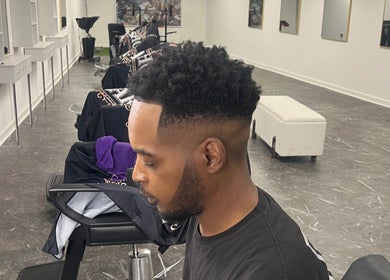 Modern haircut styled at MG TRIMZ, located in Leeds, England, GB, showcasing sharp and clean lines.