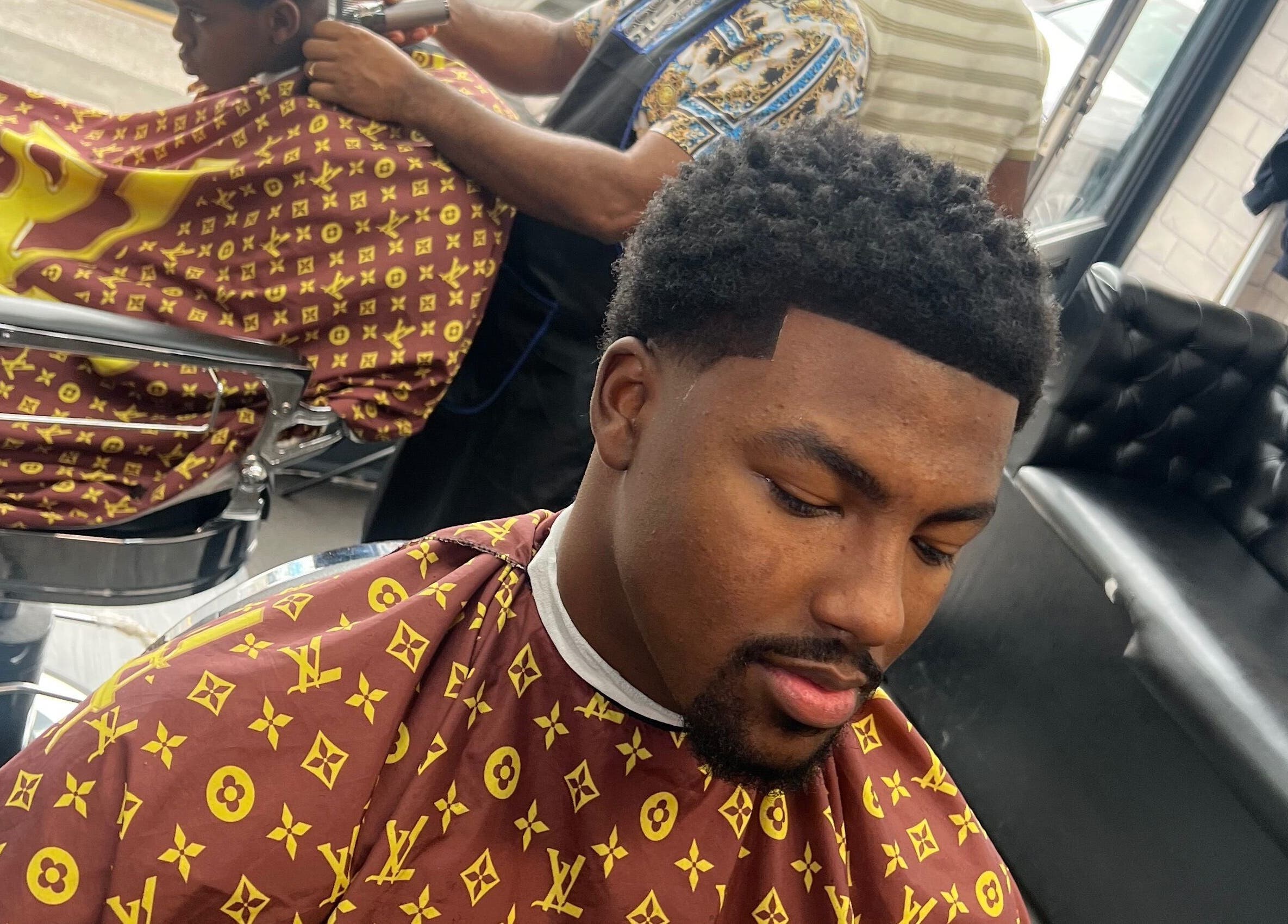 Client receives stylish haircut at MG TRIMZ in Leeds, England, GB.