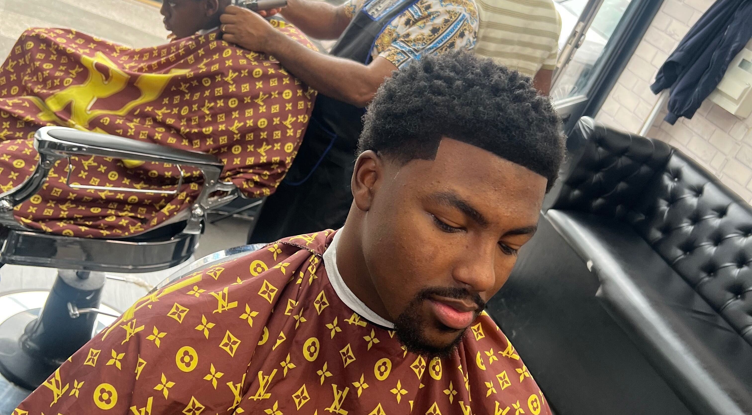 Client receives stylish haircut at MG TRIMZ in Leeds, England, GB.