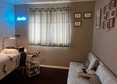 Relaxing treatment room at Lush Lab, Burnley, England, GB with a comfortable bed and serene atmosphere.