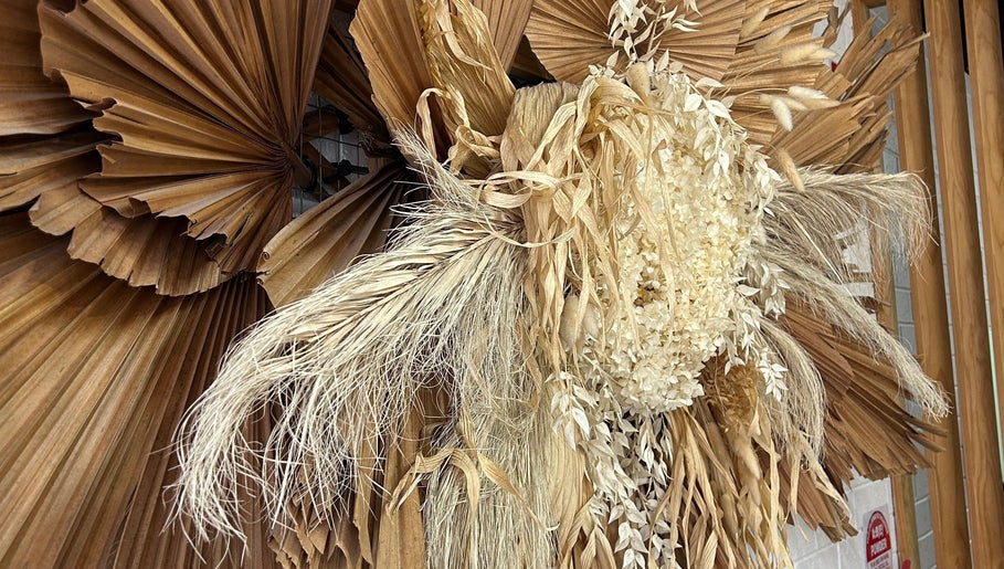 Dried floral arrangement at The Hair Society By Leearne, Budgewoi, New South Wales, AU showcases rustic beauty.