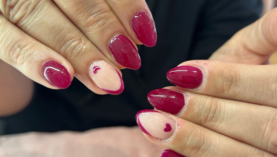 Elegant nail art with rosy tones at Jade Billings Hair & Beauty in Chelmsford, England, GB.