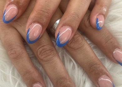 Elegant blue-tipped nails at Jade Billings Hair & Beauty, Chelmsford, England, GB. Perfect for style seekers.