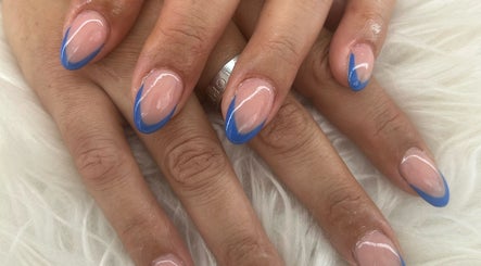 Elegant blue-tipped nails at Jade Billings Hair & Beauty, Chelmsford, England, GB. Perfect for style seekers.