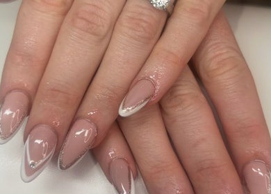 Stylish manicure with nude and white tips at Jade Billings Hair & Beauty, Chelmsford, England, GB.