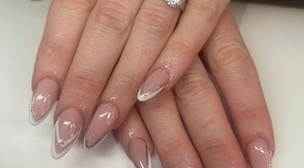 Stylish manicure with nude and white tips at Jade Billings Hair & Beauty, Chelmsford, England, GB.