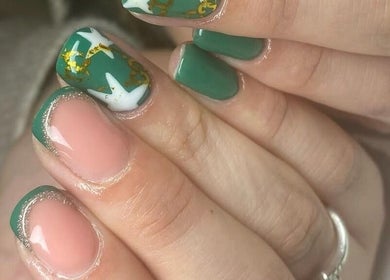 Close-up of artistic green nail art at Jade Billings Hair & Beauty in Chelmsford, England, GB.