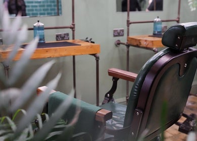 Vintage barber chair at Lishmans Barbershop, Newcastle upon Tyne, England, GB, epitomizes classic grooming style.