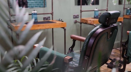 Vintage barber chair at Lishmans Barbershop, Newcastle upon Tyne, England, GB, epitomizes classic grooming style.