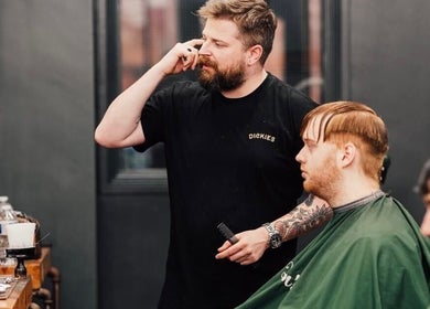 Stylist crafting a haircut at Lishmans Barbershop, Newcastle upon Tyne, England, GB.