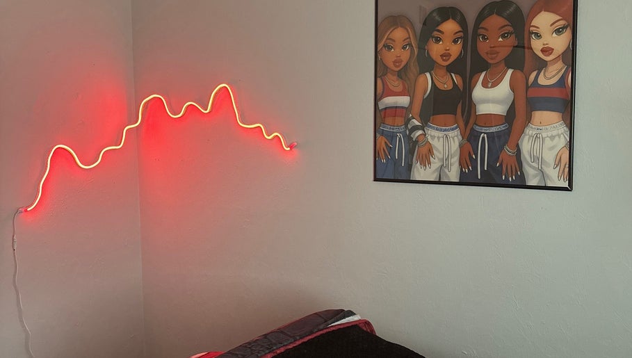 Room at SIERRA VISTA📍with red neon light and vibrant artwork, Sierra Vista, Arizona, US.