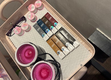 Beauty products on cart at Dopamine Studio, Bishops Cleeve, England, GB.